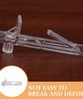 Side view of a transparent locking pin from 30 Pack Plastic Shelf Support Clips Locking Pins For Cabinets Furniture Shelving Brackets