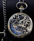 Dope Vintage Mechanical Steampunk Skeleton Pocket Watch With Carved Pattern Roman Numerals Hand Winding Movement Classic Hollow Case Chain And Box Included Distinctive Style For Everyday Wear, dragon design on bronze blue finish