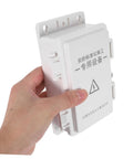 Hohopeti Heavy Duty Waterproof Electrical Junction Box for Outdoor Wiring being held, sturdy plastic design for camera setup.