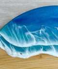 Close-up of resin wave design on 14 Inch Lazy Susan with resin wave design and wood construction a smooth rotating tray