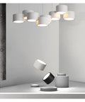 Top Tier Led Pendant Light With Built Tough Iron Frame And Easy Dimmable Toggle Perfect For Kitchens Or Living Rooms Featuring Scratch Resistant Paint And Warm Acrylic Shades That Slap Some Serious Style On Your Main Space, showcasing multiple white and black fixtures in modern design.