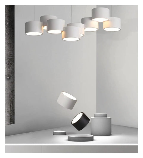 Sleek Six Head Led Pendant Lamp With Rock Solid Iron Frame Smooth Dimming Tech And Cozy Ambient Glow To Straight Up Level Up Your Modern Kitchen Dining Room Living Room Aesthetic Game hanging over minimalist decor.