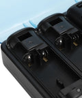 Close-up of 4 In 1 Remote Charging Station with black battery slots and blue cover, suitable for game controllers.