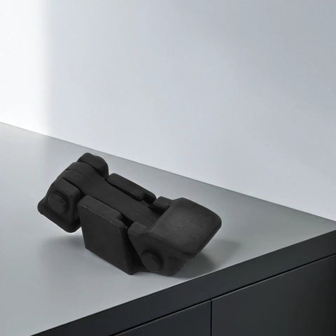 Heavy Duty Rubber Toggle Latch Buckle For Cabinet And Motorcycle Trunk, M6 And M8 Size Fits Perfectly durable black latch on gray surface.