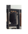 Freestanding Gray Wood Closet System With Five Modular Wardrobe Units For No Stress Setup showcases hanging dresses and tops.