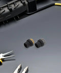 Kick Stubborn Grime With This Game Changing 10 Piece Steam Cleaner Brush Heads Replacement Kit copper steel bristles tools laid out on a dark surface.