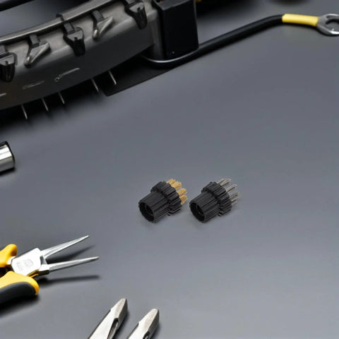 Kick Stubborn Grime With This Game Changing 10 Piece Steam Cleaner Brush Heads Replacement Kit copper steel bristles tools laid out on a dark surface.