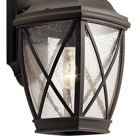 Tangier Thirteen Point Five Inch One Light Outdoor Wall Lantern In Olde Bronze With Clear Seeded Glass mounted on wall