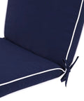 Close-up of navy cushion with white piping, part of Set Of 4 Outdoor Patio Chair Cushions 20 By 17 Inch Seat Cushions With Ties, Water Resistant UV Protected All Weather Cushions For Patio Furniture, 2 Inch Thick