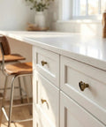 Antique Brass Heart Cabinet Knobs With Hammered Texture Solid Metal Drawer Pulls And Handles For Boho Nursery Dresser Kitchen Cabinets And Bathroom Vanity Decor installed on white kitchen cabinets