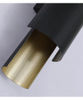 Sleek Black Wall Lamp With E27 Socket For Living Room TV Wall And Entryway Glare Free Indoor Sconce showing a close-up of its gold interior.