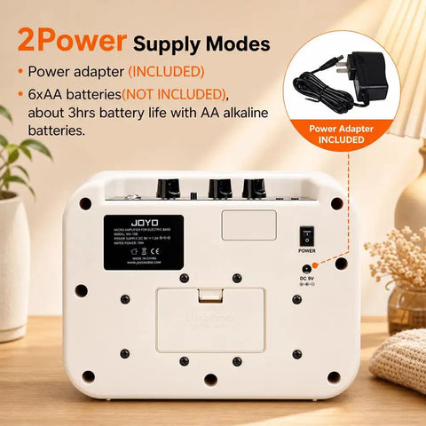 Back view of Compact 10W Bass Amp For Practice Dual Channel Normal And Drive showing battery compartment and power options.