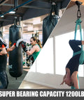 Heavy Duty 360 Degree Rotating Hammock Hooks Kit With 1200 Lb Capacity in gym with punching bag and aerial yoga