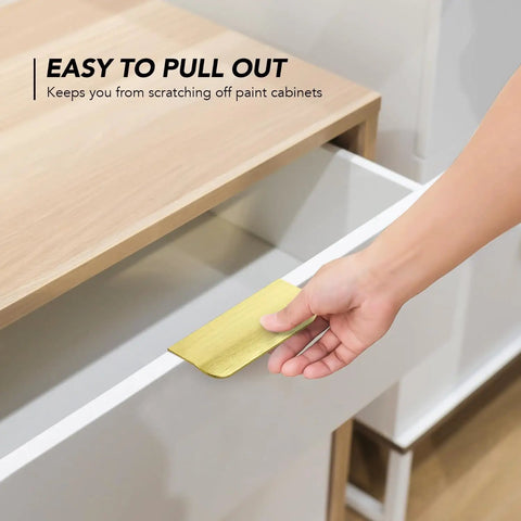 Premium Gold Cabinet Handles Finger Edge Pulls sleek brushed finish being used to open a drawer with ease.