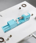 Mini Metal Wood Lathe Machine Corded Electric Compact Desktop Milling Tool For Small-Leaf Rosewood Craft Projects on a workbench.