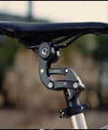 Close-up of suspension seatpost with 4-link parallelogram system for road gravel MTB and E bikes, 27.2 to 33.9mm fit.