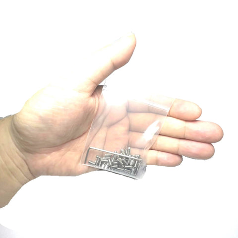 Hand holding a bag of 25 Piece 5-40 X 1/4 Inch 304 Stainless Steel Hex Socket Set Screws Grub Screws with 1/16 Inch Allen Wrench.