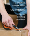 Slice 10400 box cutter with orange/black handle; 3-position slider used to cut a cardboard box.