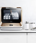 Hassle Free Plug And Play Slick Countertop Dishwasher Fully Automatic Mini Desktop Cleaner in a modern kitchen with plates inside.