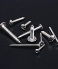 Badass 304 Stainless Steel Phillips Truss Self Drilling Sheet Metal Tek Screws Assortment Kit on black background.