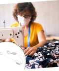 LED Sewing Machine Light With Magnetic Base And Touch Switch by sewing machine in use, fabric being worked on