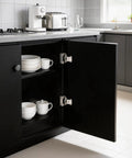 Premium Half Inch Overlay Cabinet Hinges Featuring Seamless Self Closing Action Flat Out Quality Brushed Nickel Hardware for Face Frame Doors installed on black cabinet.