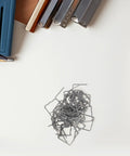 Super Quick Fix For Bumper Wreckage With 100 Pc Silver Steel Hot Stapler Plastic Repair Welding Rods Tool Kit scattered steel rods.