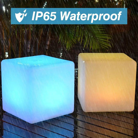 16-Inch Cordless LED Cube Light With Removable Panels shown in rain, highlighting IP65 waterproof feature