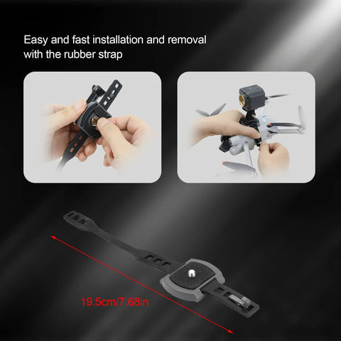Camera Expansion Mount With One Quarter Inch Adapter for DJI Mini 2 Mini 3 attached to drone with rubber strap shown.