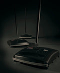 Three views of the Dual-Action Mechanical Sweeper Cordless Low-Profile with durable steel for hard floors and carpet.