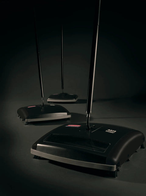 Three views of the Dual-Action Mechanical Sweeper Cordless Low-Profile with durable steel for hard floors and carpet.
