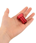 Non Slip Limit Cards 8 Piece Aluminum Alloy Table Clamp Set in red color shown on a hand for size reference
