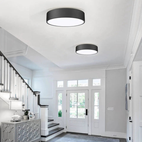 Two Light Flush Mount Ceiling Light With Slick Matte Black Frame And White Acrylic Shade in modern foyer