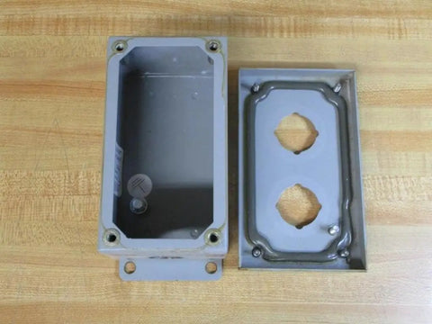 Industrial Control Panel Enclosure 2PB Series with two-hole cover on wooden surface