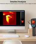 Thermal Imager With TISR 240 By 240 For Pro Grade Sharper Detail 96 By 96 VOx Sensor beside computer displaying thermal image.