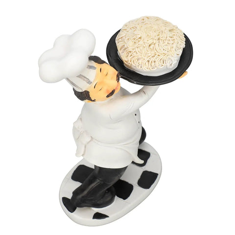 Tiny 8Cm Chef Statue Ornament For Kitchen And Office Decor Lightweight 3D Cartoon Dining Table Figurine Cute Cooking Craft Bust For Home Desk Or Shelf Accent holding a cake