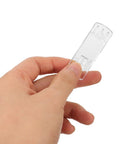 Hand holding clear plastic peg of 24 Pack Locking Shelf Pins With Anti Slip Grooves, Curved Long Rectangular Shelf Supports For 20mm Thick Cabinets And Bookshelves, Clear Plastic Pegs To Prevent Warping And Keep Shelves Sturdy.