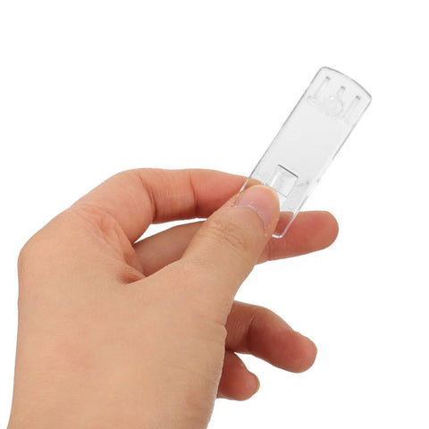 Hand holding 24 Pcs Clear Plastic Shelf Support Pegs With Anti Slip Grooves For Cabinets And Storage Racks, Curved Long Rectangular