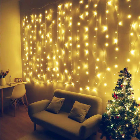 Curtain Icicle Lights 13ft By 6.5ft Warm White Low Voltage 30V With 20 Strings Of 13 LEDs Each 8 Modes Connectable in living room setting