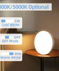Rechargeable Motion Sensor Ceiling Light with dual color temp options on table