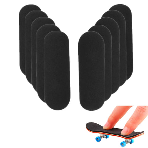 10 Pack Fingerboard Grip Tape For Pro Wooden Mini Skateboards 33mm By 98mm showing grip tape and hand on mini skateboard