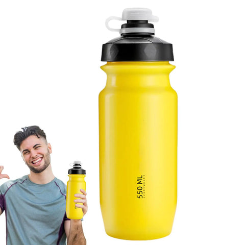 Yellow 18 Oz Spill Proof Water Bottle For Camping And Outdoors, Easy Squeeze Hydration Bottle held by a smiling person