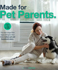 Woman petting a dog indoors with text promoting a two-stage filter for pet parents and odor reduction.