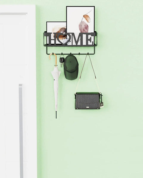 Streamline Your Entryway With This 5 Hook Wall Key Holder And Mesh Mail Basket Organizer In Matte Black Perfect For Keys And Mail And Quick Grab Essentials Before You Step Out The Door, with umbrella and hat hanging.