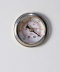 Close-up of vacuum gauge on Oil Free Diaphragm Vacuum Pump With 20 Liters Per Minute Flow For Vacuum Filtration Portable Lab Equipment 220V Maintenance Free Eco Friendly Design Plus Positive And Negative Pressure Modes.