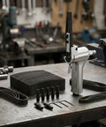 Top Shelf Pneumatic Air Belt Sander With A Ridiculously Fast 10 Mm Track And Hog Wild 16000 Rpm Motor and accessories on workbench.