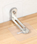 No Drill 10 Pack Furniture Wall Anchor Kit 6x6 Acrylic Stainless Steel Easy Install Anti Tip For TVs Shelves Cabinets And More Keeps Your Home Safe For Kids And Pets, clear wall anchor on wood surface