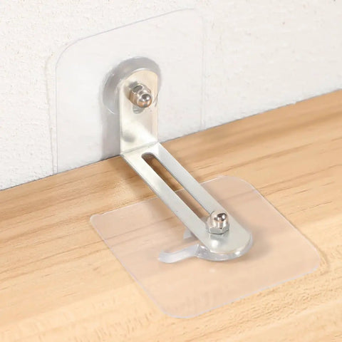 No Drill 10 Pack Furniture Wall Anchor Kit 6x6 Acrylic Stainless Steel Easy Install Anti Tip For TVs Shelves Cabinets And More Keeps Your Home Safe For Kids And Pets, clear wall anchor on wood surface