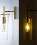 Set of 2 Gold Wall Sconces With Clear Glass Shade, Modern Metal Wall Mount Lamps, illuminated and unlit views, Glam Gold Finish