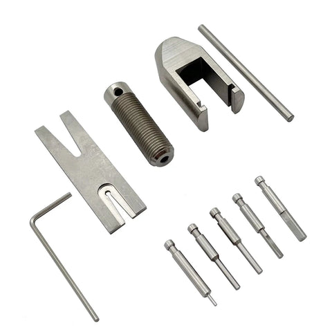 Pinion Gear Puller Kit For RC Motors And Pinion Removal shown with metal components, including varied pin sizes, for small to medium motors.